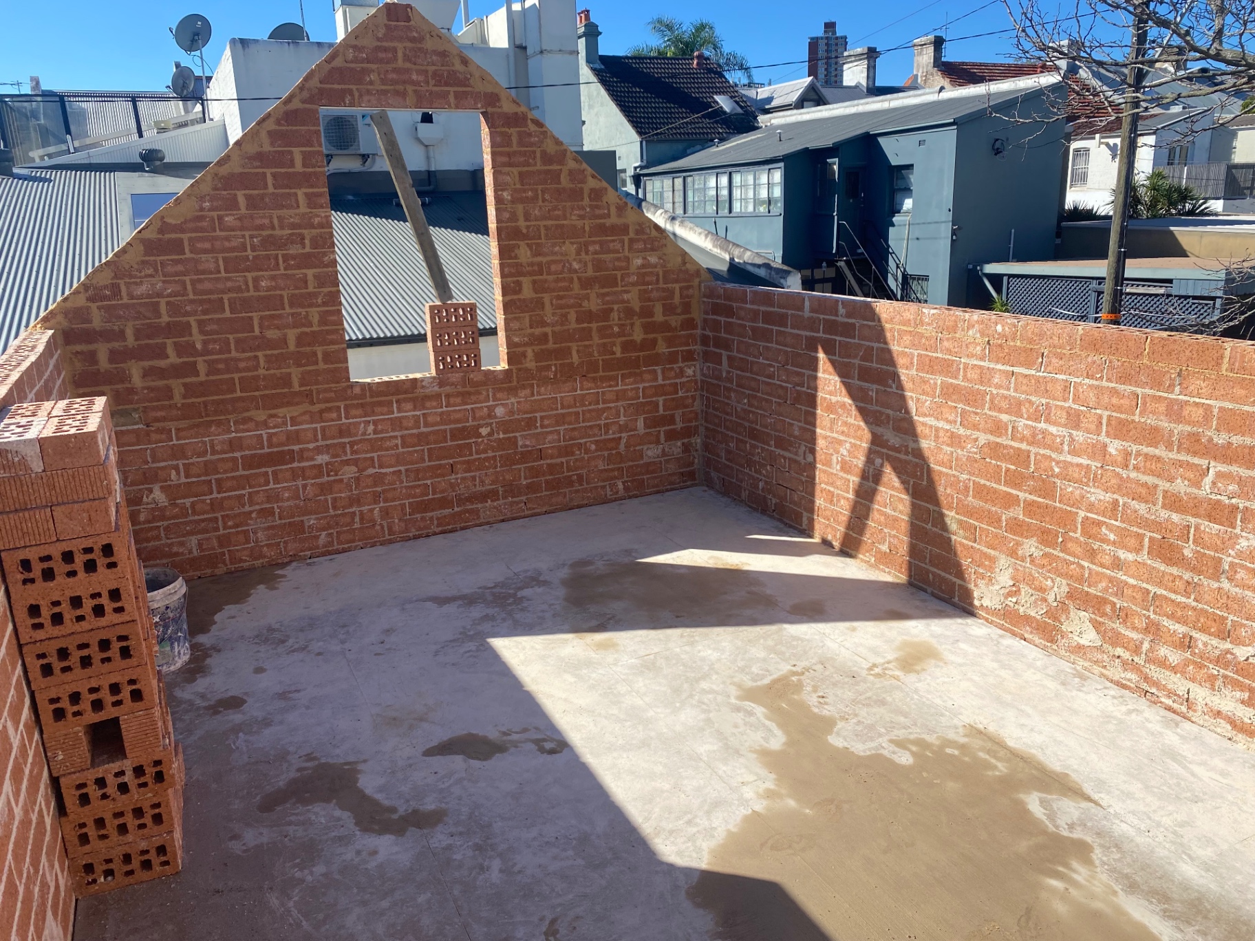 Red brick walls under construction